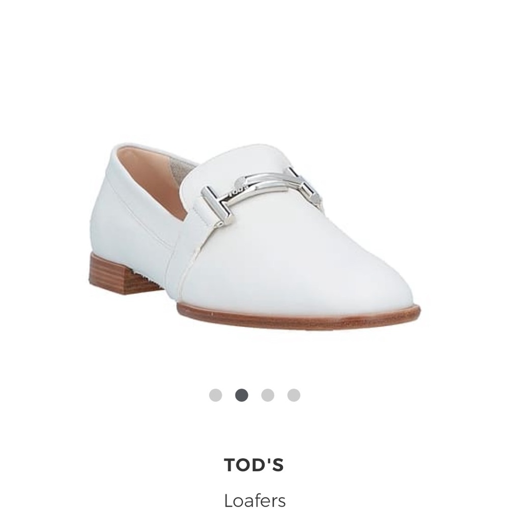 Classic:  Tod's white loafers with silver detail